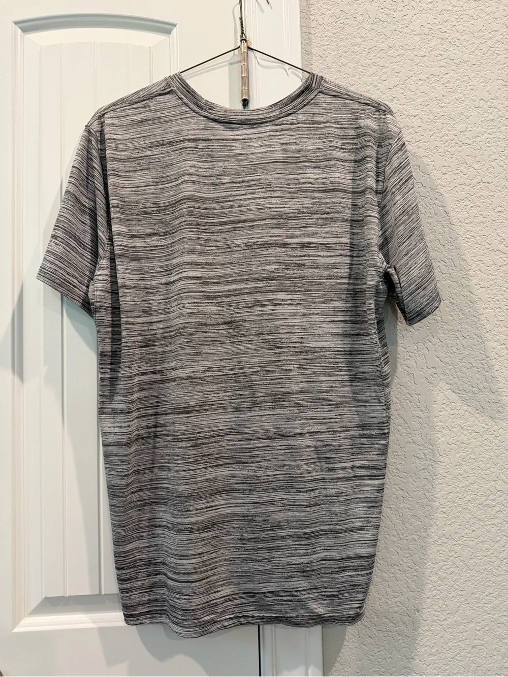 Nike Dallas Cowboy’s Men's Gray Short-Sleeve Tee with Navy Star Graphic
